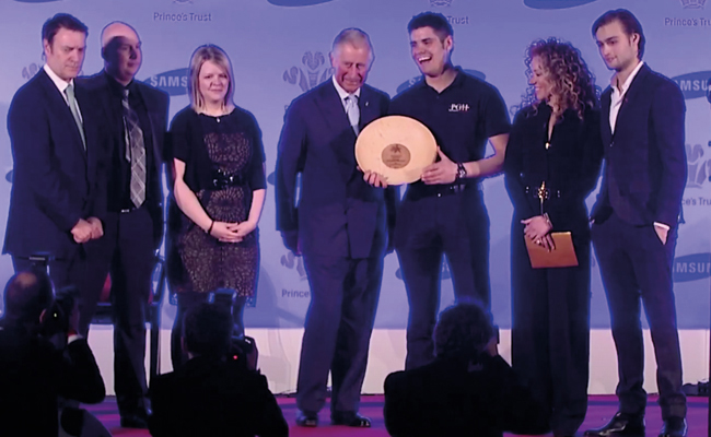 Peter receiving an award
