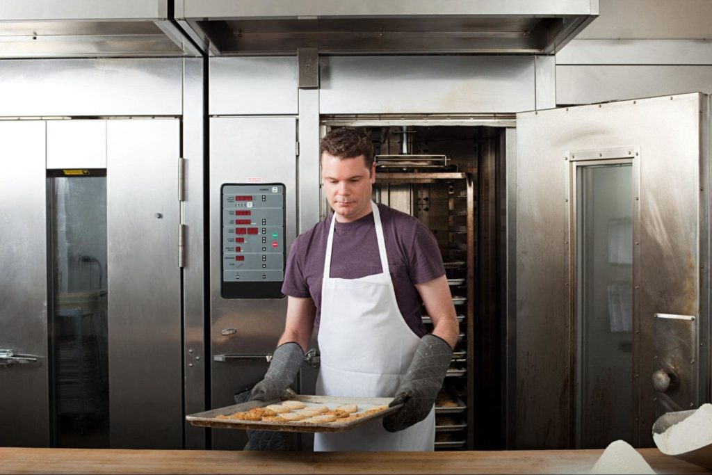 Opening a Cinnabon in The UK Person baking in apron