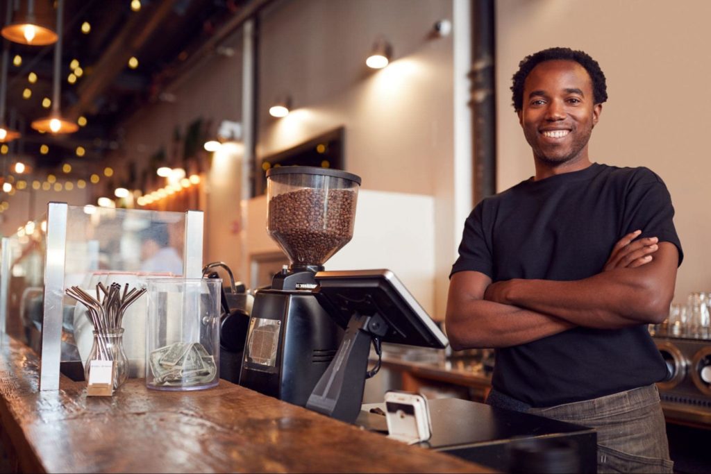 person working as barista