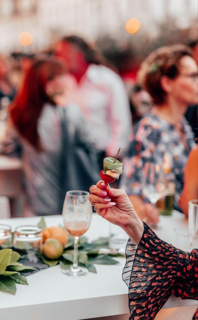 A woman eating hors d'oeuvres