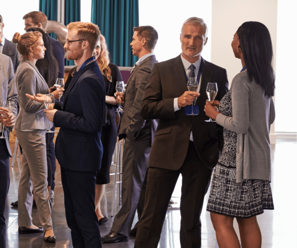 FL Body2 Franchise Exhibition Guide min A man and a woman at a networking event | Franchise Local