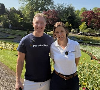 A person and person standing in a park