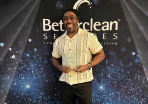 Patrick with Award (1) Patrick with Award (1)
